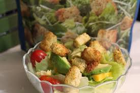 Caesar salad with chicken nuggets